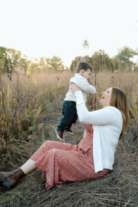 Mom and son playing in a field