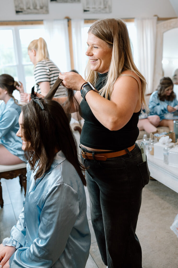 Bridesmaid getting hair done