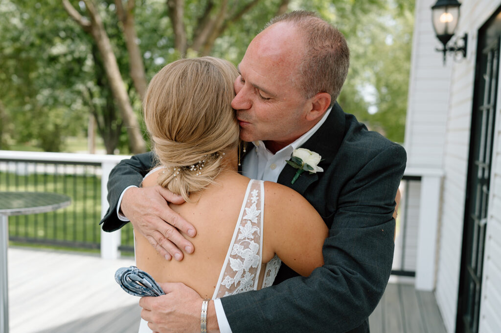 Father and daughter first look on wedding day