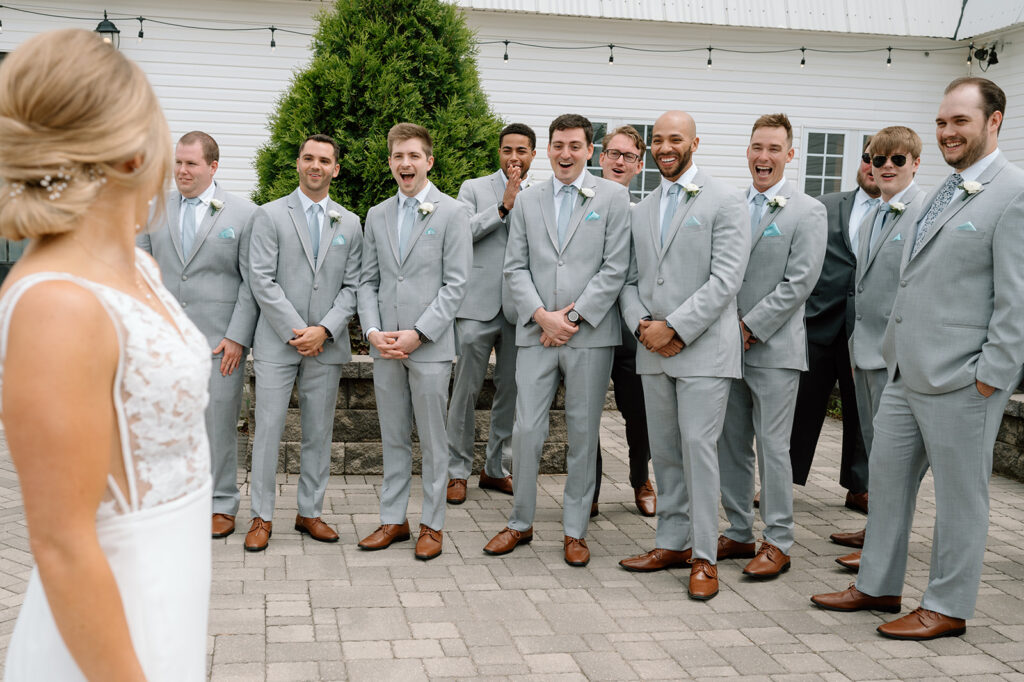 Groomsmen first look with bride